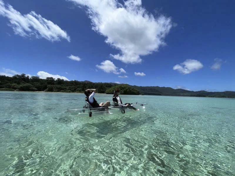 A transparent kayak experience that merges with the crystal-clear blue sea
